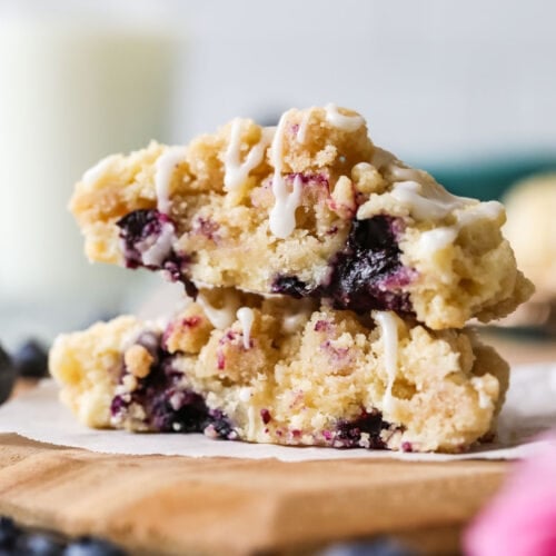 Cross section of blueberry muffin cookies topped with streusel and glaze.