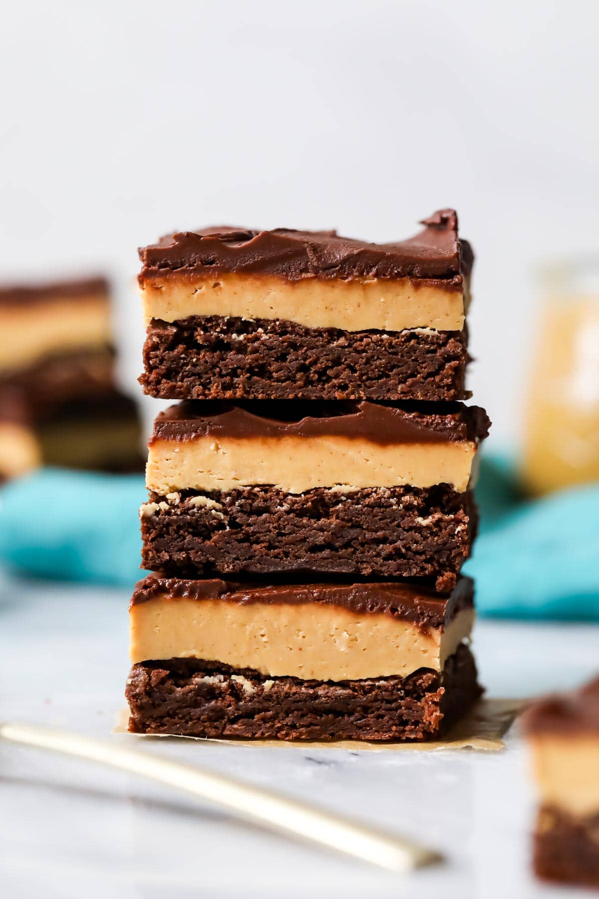 Stack of three buckeye brownies.