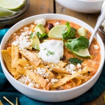 CHICKEN tortilla soup in white bowl