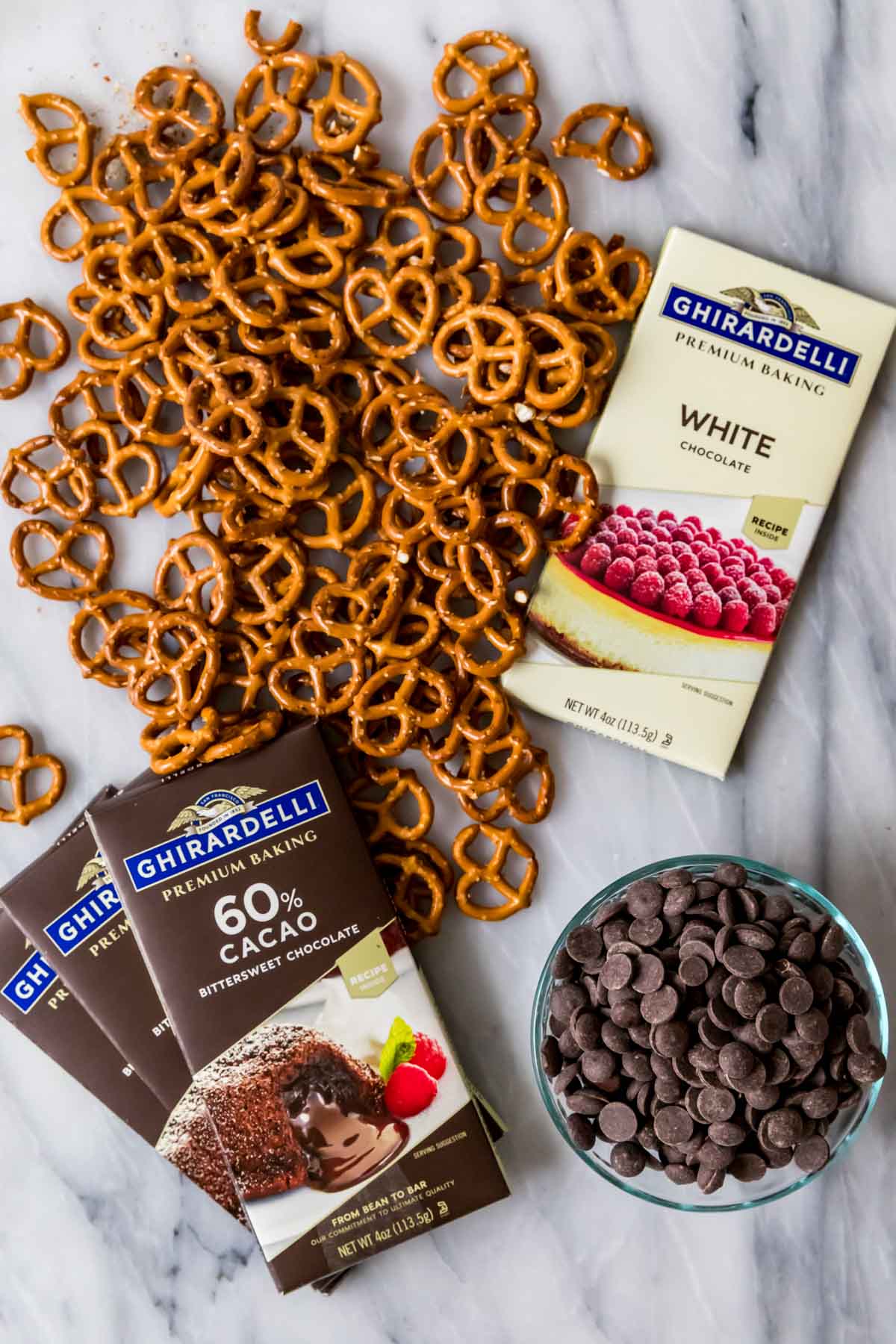 Overhead view of ingredients including chocolate and pretzels.