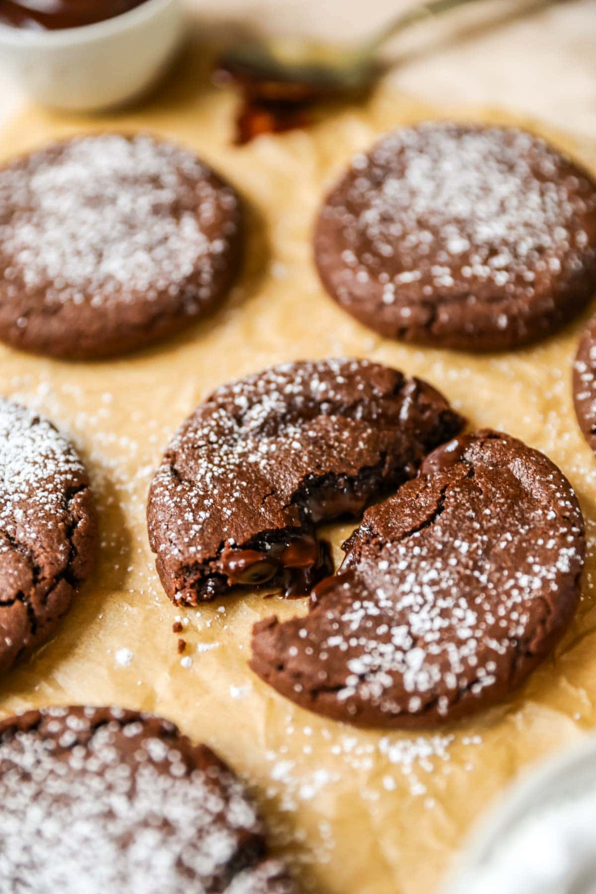 Chocolate lava cookie that's been broken in half.