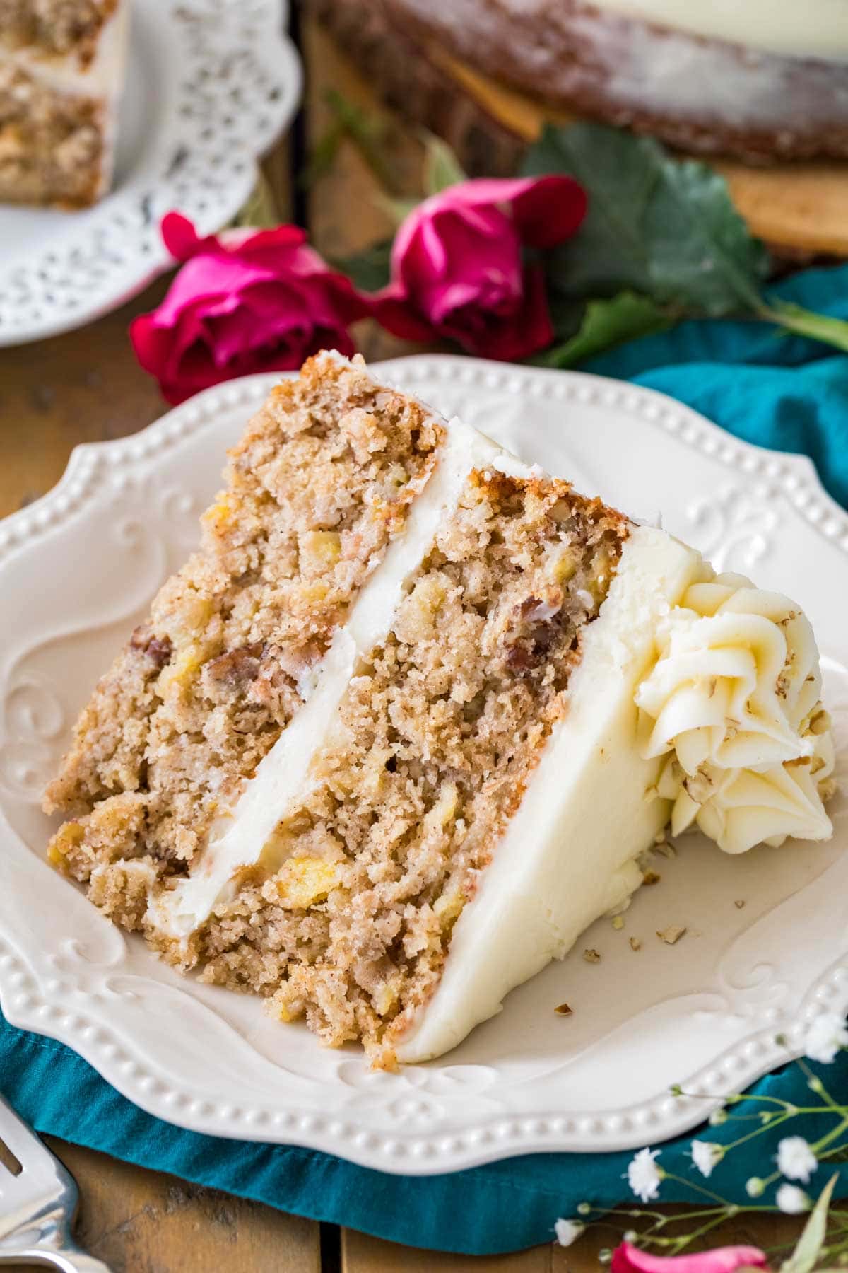 Hummingbird cake slice on white plate