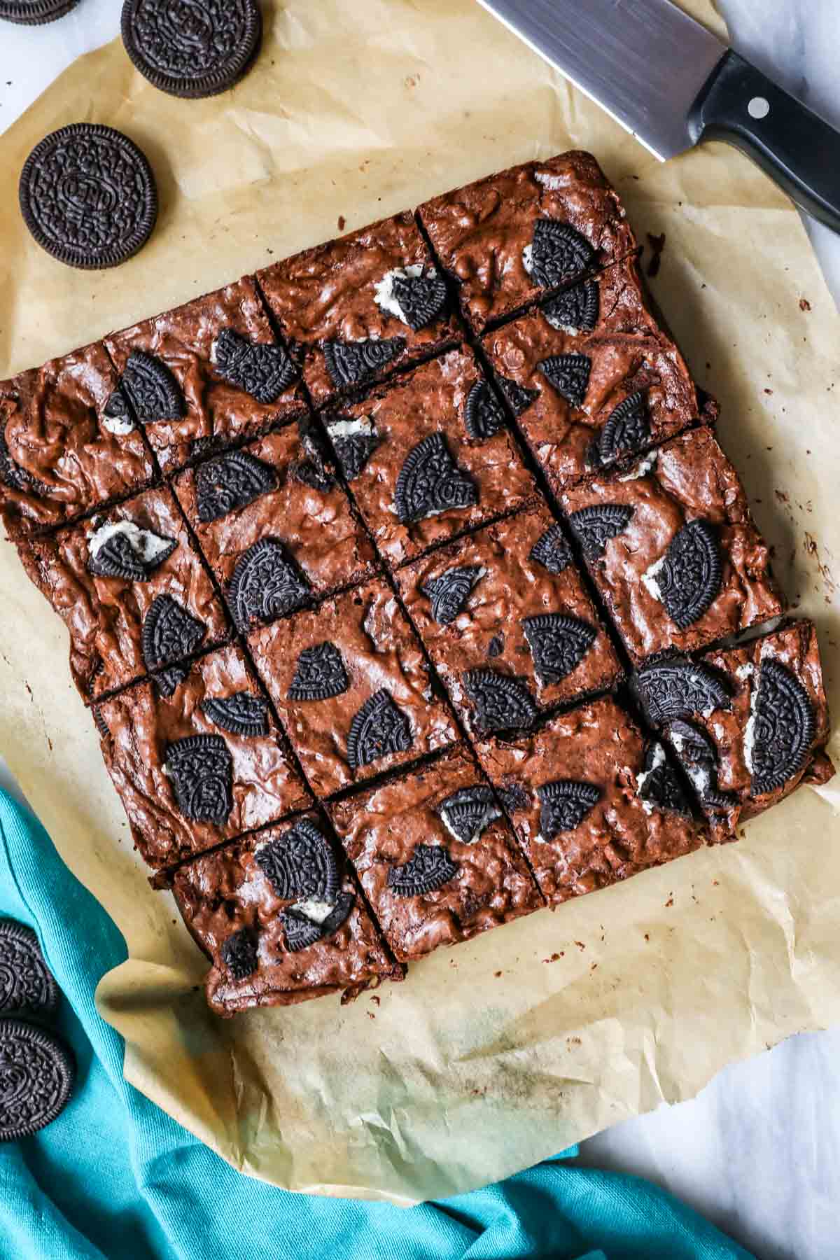 Overhead view of a batch of Oreo brownies just after cutting.